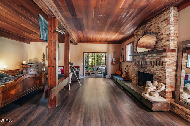 recreation room with wood ceiling, dark hardwood / wood-style floors, and a fireplace