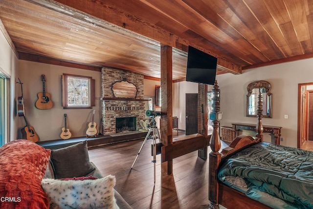 bedroom featuring wood ceiling, wood-type flooring, and a fireplace