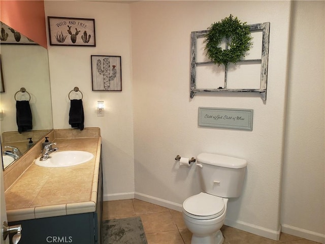 11710 Paskenta Rd, Red Bluff, CA 96080 - bathroom with tile patterned floors, baseboards, vanity, and toilet
