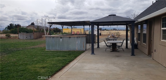 view of patio / terrace with a gazebo and a jacuzzi