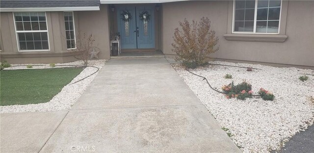 11710 Paskenta Rd, Red Bluff, CA 96080 - doorway to property with stucco siding