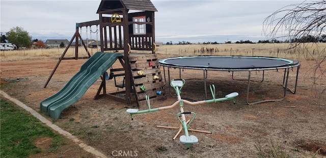 view of jungle gym featuring a trampoline