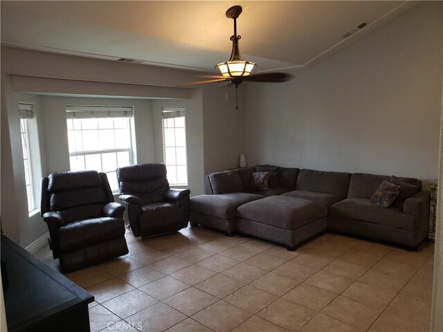 11710 Paskenta Rd, Red Bluff, CA 96080 - living room with ceiling fan, visible vents, and light tile patterned floors