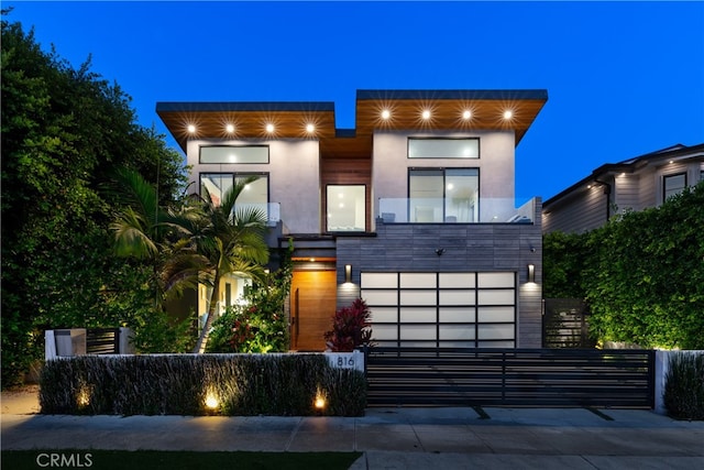 modern home featuring a garage