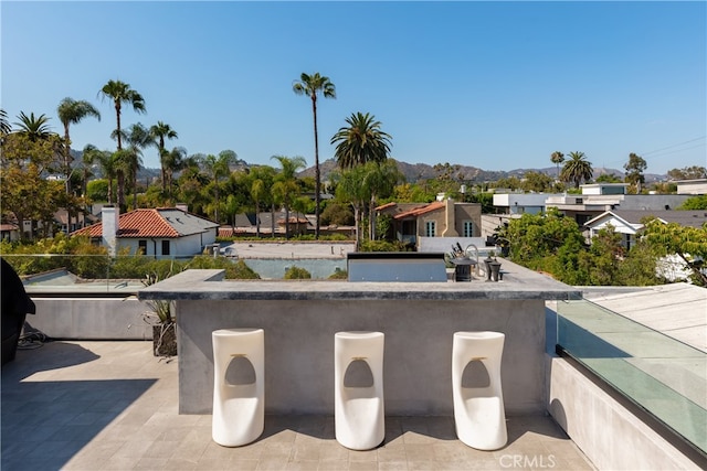 view of patio featuring a mountain view