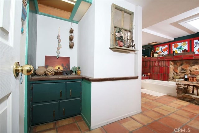 hallway featuring tile patterned floors