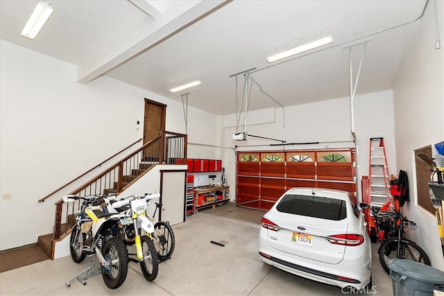 garage featuring a garage door opener