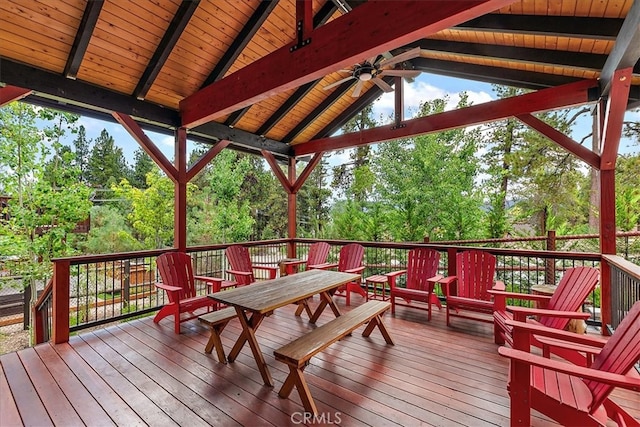 wooden terrace with ceiling fan and a gazebo