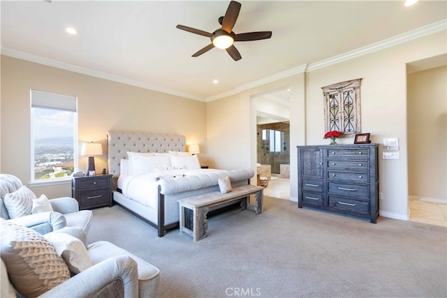 bedroom with light carpet, crown molding, ceiling fan, and connected bathroom