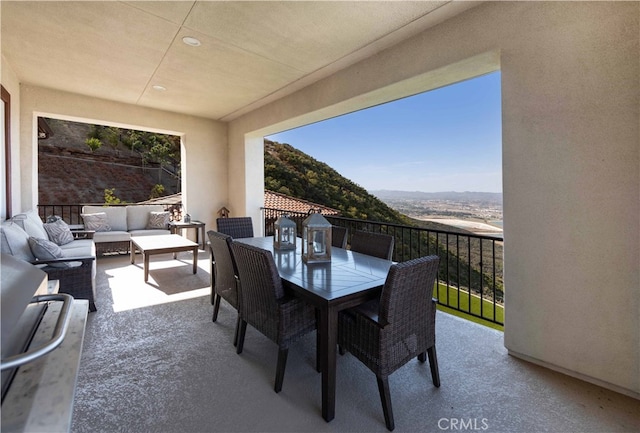 view of patio / terrace featuring outdoor lounge area and a balcony