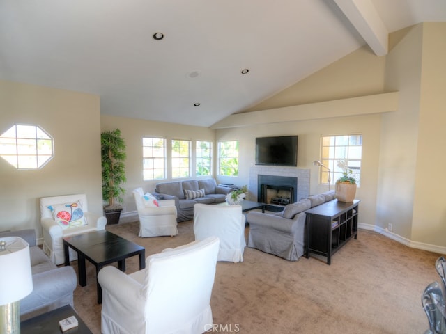 living room featuring vaulted ceiling with beams, a fireplace, and carpet