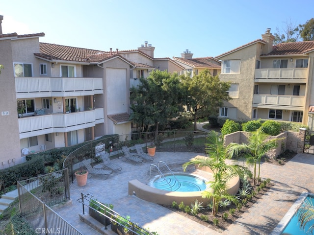 view of home's community with a pool