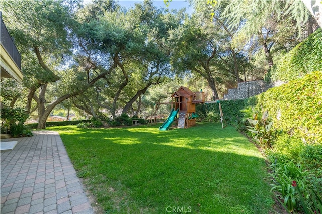 view of yard with a playground