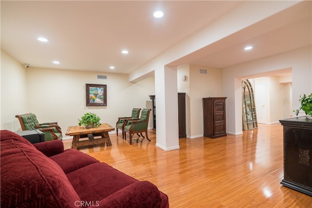 living room with light hardwood / wood-style floors