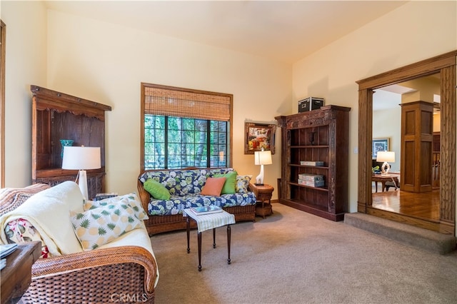 sitting room with light colored carpet