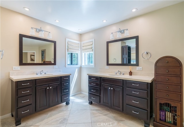 bathroom with vanity and tile patterned floors