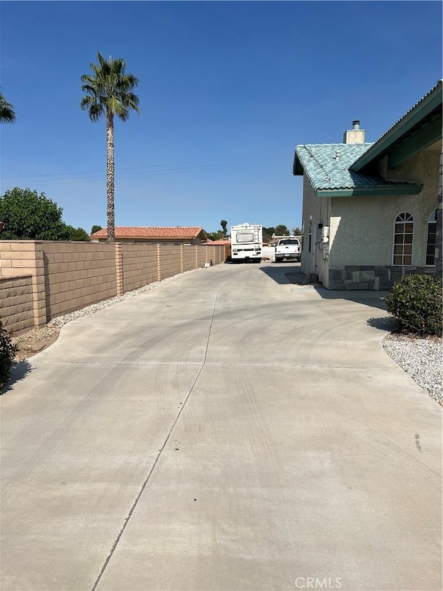 view of patio / terrace featuring fence