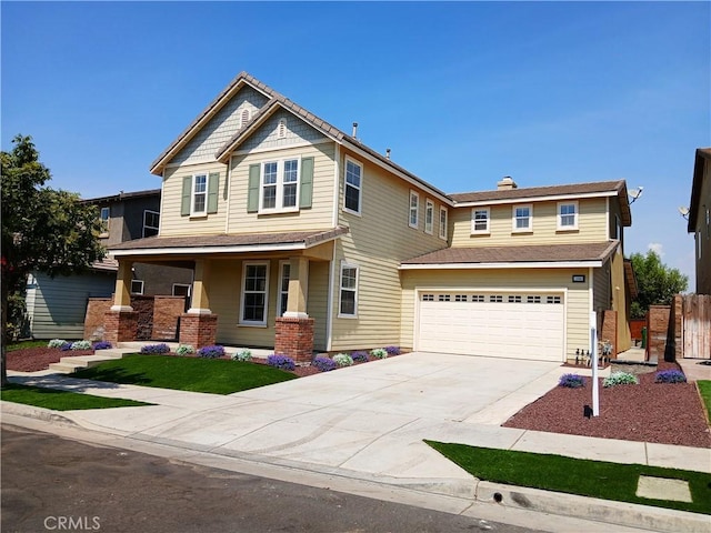 craftsman inspired home with covered porch and a garage