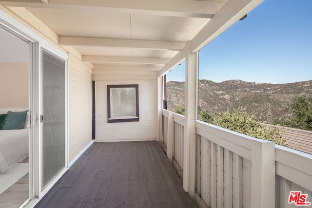 balcony featuring a mountain view