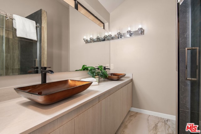 bathroom featuring lofted ceiling, an enclosed shower, and vanity