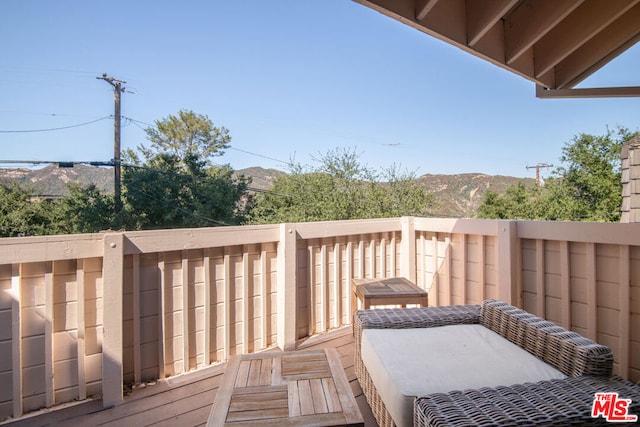 deck with a mountain view