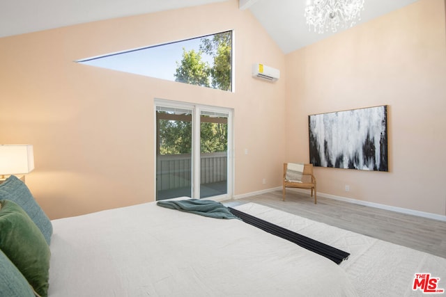 bedroom with access to outside, beamed ceiling, light hardwood / wood-style flooring, high vaulted ceiling, and an AC wall unit