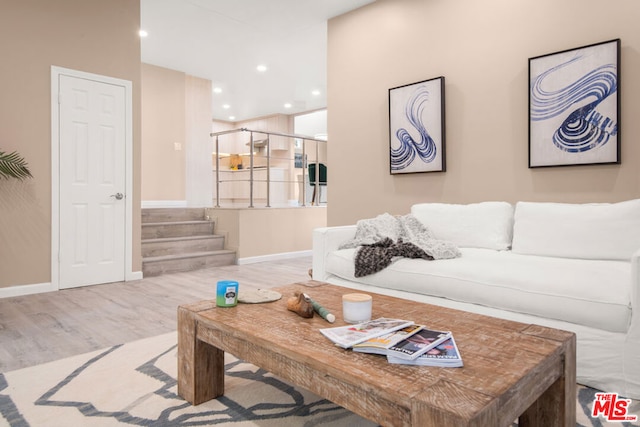 living room with light hardwood / wood-style floors