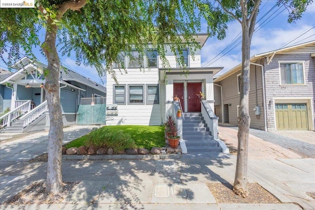 view of front of property with a garage