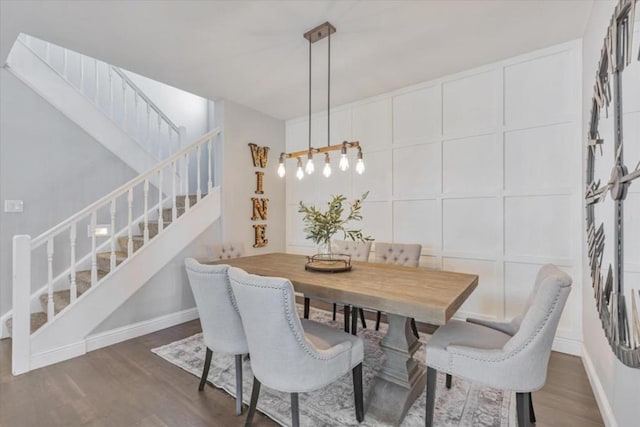 dining room with dark wood-type flooring