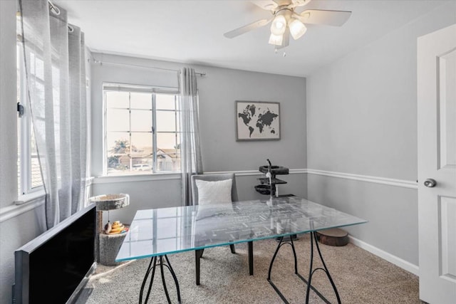 office featuring ceiling fan and carpet floors