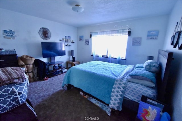 bedroom featuring carpet flooring