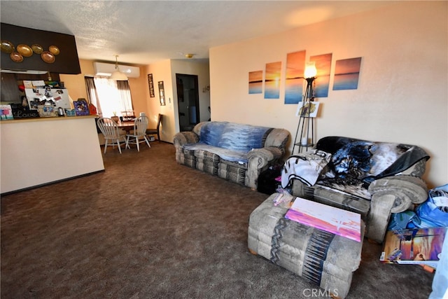 living room with dark carpet and a textured ceiling