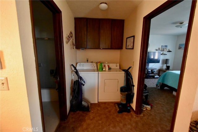 laundry area with cabinets, independent washer and dryer, and carpet floors