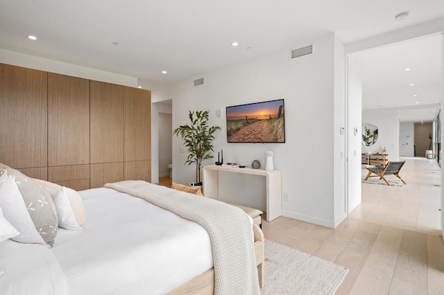 bedroom featuring light hardwood / wood-style flooring