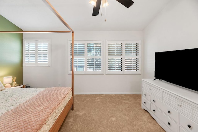 bedroom featuring ceiling fan and light colored carpet