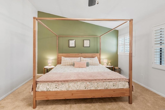 bedroom with carpet, ceiling fan, and lofted ceiling