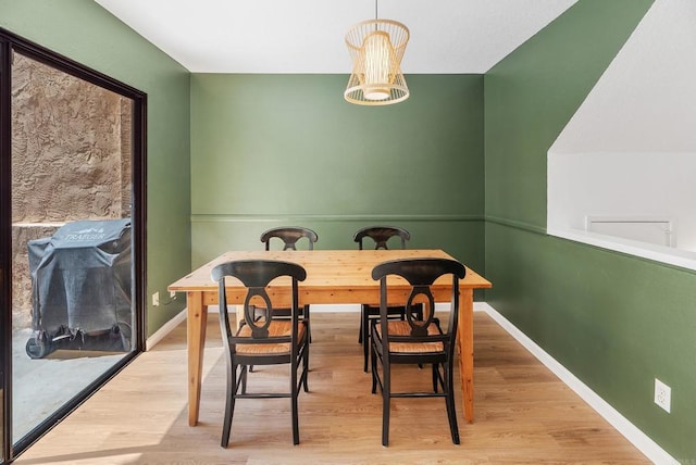 dining room featuring light hardwood / wood-style flooring