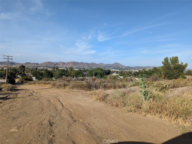 mountain view featuring a rural view