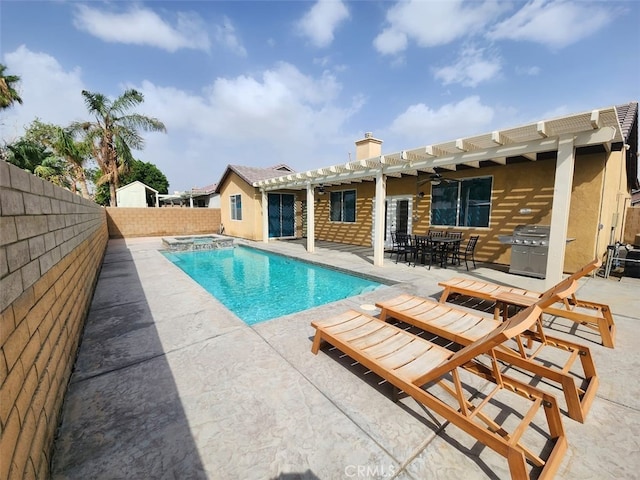 view of pool featuring a patio and a grill