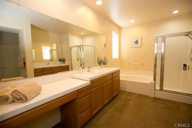 bathroom with vanity and plus walk in shower