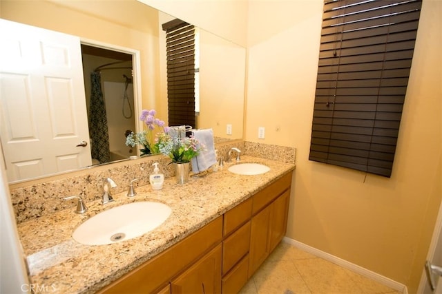 bathroom with shower / bath combination with curtain, vanity, and tile patterned flooring