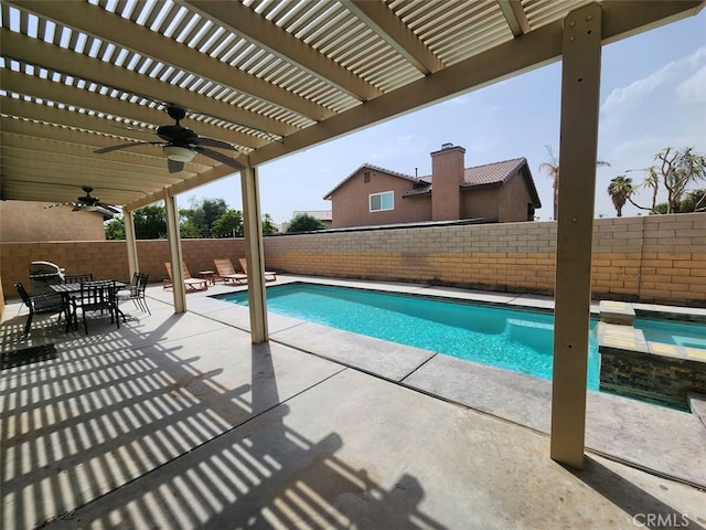 view of pool with a patio area, ceiling fan, and a pergola