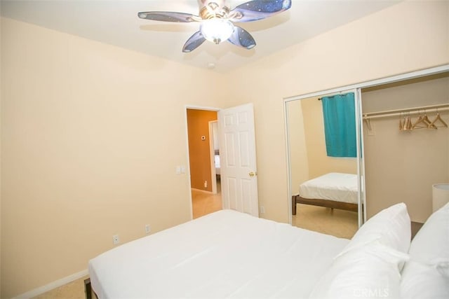 bedroom with a closet and ceiling fan