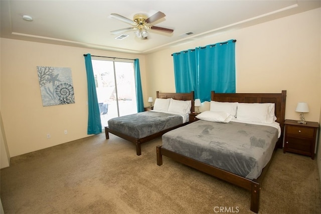 bedroom with ceiling fan, light colored carpet, and access to exterior