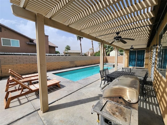 view of pool with a pergola, ceiling fan, and a patio