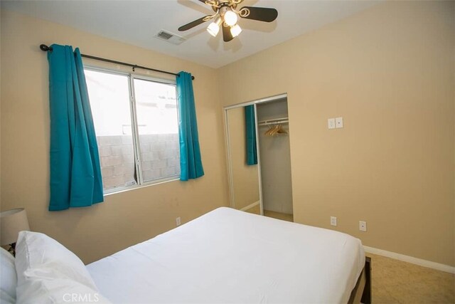 bedroom with a closet and ceiling fan