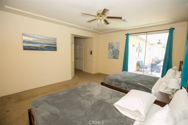 carpeted bedroom with access to outside and ceiling fan