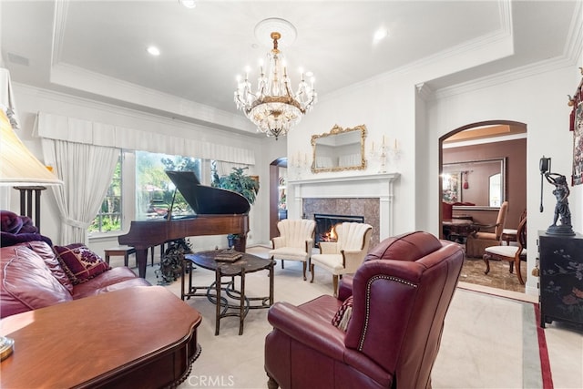 carpeted living room featuring crown molding, an inviting chandelier, and a raised ceiling