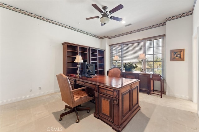 office area featuring ceiling fan and light carpet