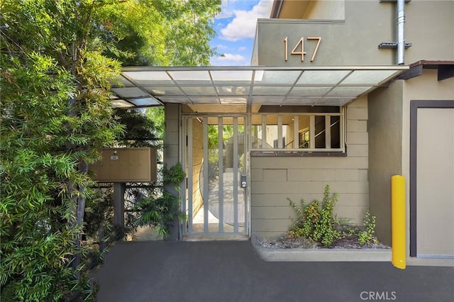 exterior space featuring a carport